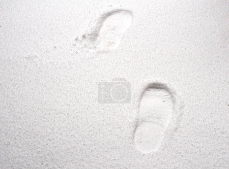 Foto de Pisadas humanas frescas en la nieve - Imagen libre de derechos