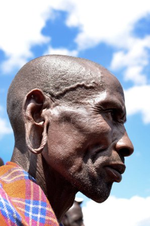Photo for Masai man, travel place on background - Royalty Free Image