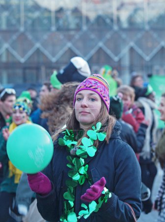 Photo for Woman spectator at st. patrick's day - Royalty Free Image