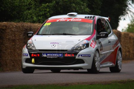 Photo for Nick Hamilton driving his Renault Clio cup racecar - Royalty Free Image