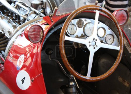 Photo for Historic racecar dashboard and steering wheel - Royalty Free Image