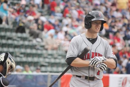 Photo for "Indianapolis Indians Alex Presley reacts after striking out in a game". Baseball Game Concept - Royalty Free Image