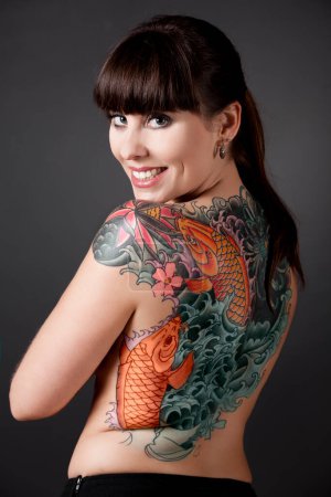 Photo for Woman with a tattoo - Royalty Free Image