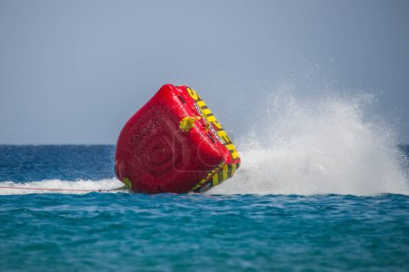 Photo for Rubber boat tipping over in the red sea - Royalty Free Image