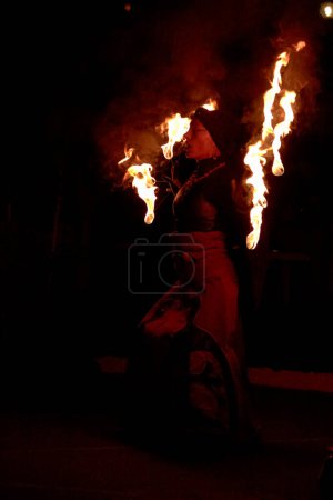 Photo for Fire dance show at night - Royalty Free Image