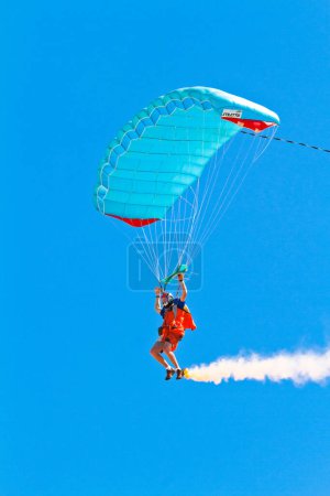 Photo for CADIZ, SPAIN - SEPTEMBER 11, 2011: Parachutist Rex Pemberton taking part in the 4th airshow of Cadiz on September 11, 2011 in Cadiz, Spain. - Royalty Free Image