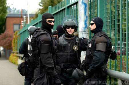Photo for PORTLAND, OREGON - NOVEMBER 17, 2011: Portland Police in Riot Gear Closeup in Downtown Portland, Oregon during a Occupy Portland Protest Against Banks on the first anniversary of Occupy Wall Street - Royalty Free Image