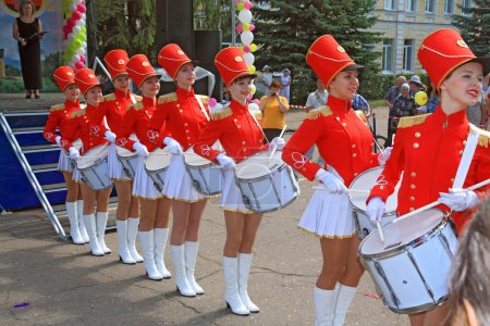 Photo for "Staraya Russa, Russia - July 9: Young drummer girls at the parade" - Royalty Free Image