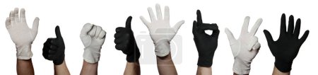 Foto de Símbolo de trabajo en equipo con guantes blancos y negros - Imagen libre de derechos
