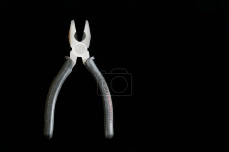 Photo for Pliers on black background - Royalty Free Image