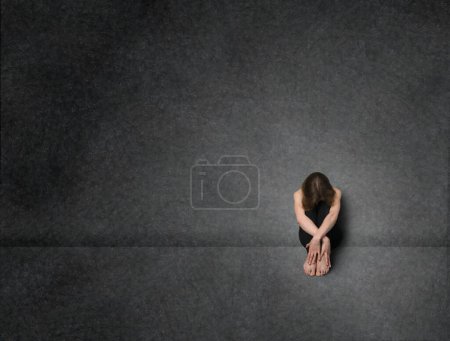 Photo for Sad woman, studio shot - Royalty Free Image