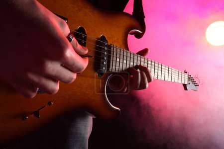 Photo for Guitar player in action on stage - Royalty Free Image