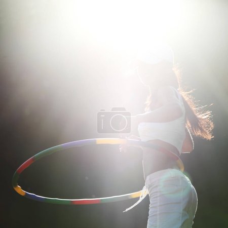 Photo for Woman with hula hoop - Royalty Free Image