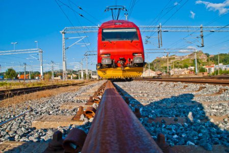 Photo for Train with red rails in the summer. - Royalty Free Image