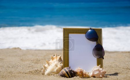 Photo for Photoframe on sandy beach - Royalty Free Image