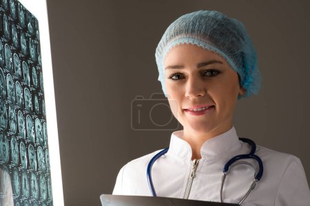 Photo for Doctor looking at the x-ray. Healthcare and medicine concept - Royalty Free Image