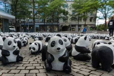 Photo for World Wildlife Fund (WWF) draws attention to the endangered giant pandas with an action in the city of Kiel, Germany - Royalty Free Image