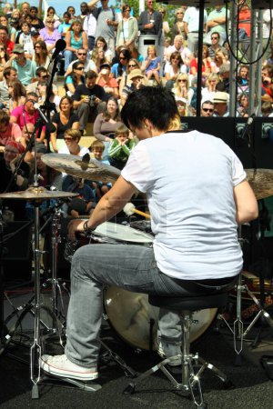 Photo for Young man playing drums, Backstage View - Royalty Free Image