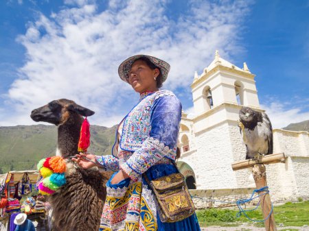 Photo for Old Peruvian woman and her alpaca - Royalty Free Image