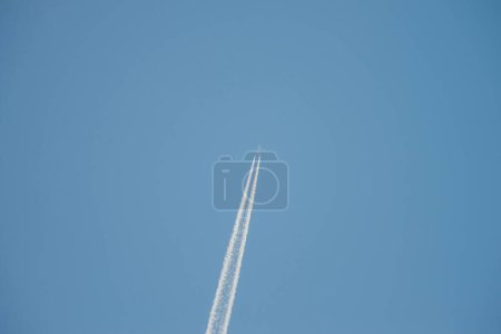 Photo for Jet aircraft climbs in the sky - Royalty Free Image