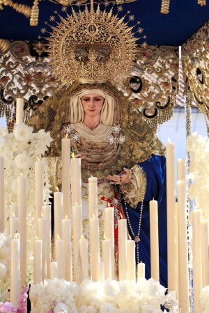 Photo for Cedar wood carving of Virgen del Amor Hermoso during procession of Holy Week, Linares, Jaen, Andalusia, Spain - Royalty Free Image