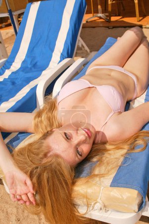 Photo for Famous Danish actress Gry Bay sunbathing on sun lounger and wearing bikini, France, Cannes - Royalty Free Image