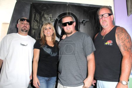Photo for Jarrod Schulz, Brandi Passante, Brandon Sheets, Darrell Sheetsat the Grand Opening of "Storage Wars" Jarrod Schulz and Brandi Passante's new Now and Then Secondhand Store, Orange, CA 10-08-11 - Royalty Free Image