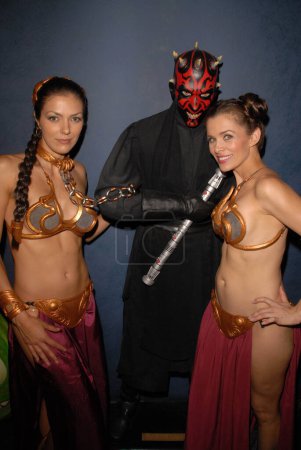 Photo for Adrianne Curry and Alicia Arden at the Slave Leia day tour and photo shoot with Jabba the Hutt, featuring members of LeiasMetalBikini.com and CelebrityCosplay.com, Gentle Giant Studios, Burbank, CA. 07-16-10 - Royalty Free Image