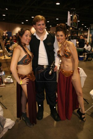 Photo for Alicia Arden from CelebrityCosplay.com as Slave Leia with friends at Long Beach Comic-Con Day 3, Long Beach Convention Center, Long Beach, CA. 10-31-10 - Royalty Free Image
