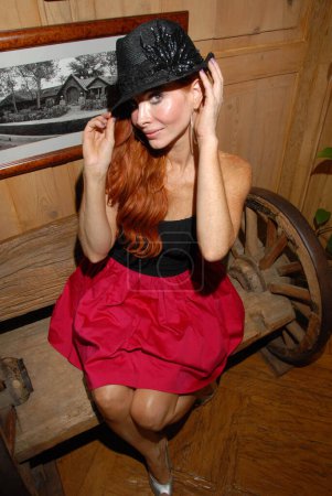 Téléchargez les photos : Phoebe Price wearing dress with hat on set of 'Paradise Cove'. Private Location, Malibu - en image libre de droit