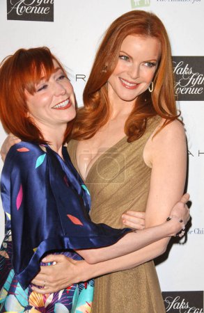 Photo for Marcia Cross and friend at the Opening of the New Elie Tahari Boutique within Saks Fifth Avenue to benefit the Alliance for Children's Rights. Saks Fifth Avenue Beverly Hills, Beverly Hills, CA. 10-16-07 - Royalty Free Image