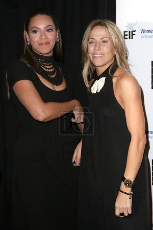 Photo for Beyonce Knowles and Sheryl Crow at the 14th Annual Saks Fifth Avenue's 'Unforgettable Evening' benefiting the Entertainment Industry Foundation's Women's Cancer Research Fund. Beverly Wilshire Hotel, Beverly Hills, CA. 02-10-09 - Royalty Free Image