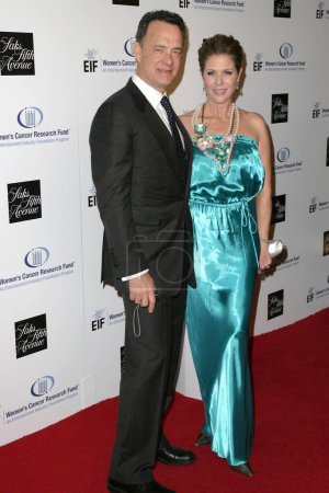 Téléchargez les photos : Tom Hanks et Rita Wilson à la 14e soirée inoubliable de la 14e édition du Saks Fifth Avenue au profit du Fonds de recherche sur le cancer chez les femmes de la Fondation de l'industrie du divertissement. Beverly Wilshire Hotel, Beverly Hills, CA. 02-10-09 - en image libre de droit