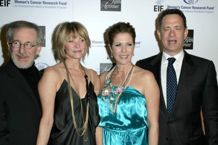 Photo for Steven Spielberg and Kate Capshaw with Rita Wilson and Tom Hanks at the 14th Annual Saks Fifth Avenue's 'Unforgettable Evening' benefiting the Entertainment Industry Foundation's Women's Cancer Research Fund. Beverly Hills, CA. 02-10-09 - Royalty Free Image