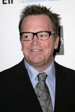 Photo for Tom Arnold at the 14th Annual Saks Fifth Avenue's 'Unforgettable Evening' benefiting the Entertainment Industry Foundation's Women's Cancer Research Fund. Beverly Wilshire Hotel, Beverly Hills, CA. 02-10-09 - Royalty Free Image