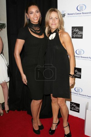 Photo for Beyonce Knowles and Sheryl Crow at the 14th Annual Saks Fifth Avenue's 'Unforgettable Evening' benefiting the Entertainment Industry Foundation's Women's Cancer Research Fund. Beverly Wilshire Hotel, Beverly Hills, CA. 02-10-09 - Royalty Free Image
