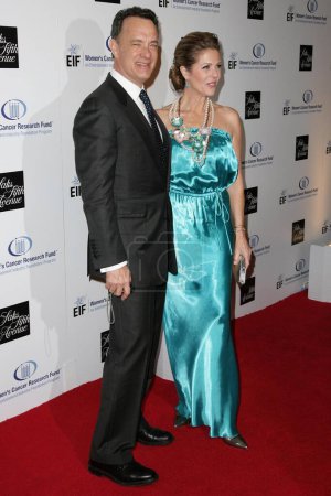 Photo for Tom Hanks and Rita Wilson at the 14th Annual Saks Fifth Avenue's 'Unforgettable Evening' benefiting the Entertainment Industry Foundation's Women's Cancer Research Fund. Beverly Wilshire Hotel, Beverly Hills, CA. 02-10-09 - Royalty Free Image