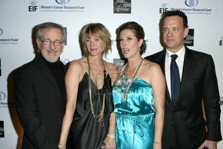 Photo for Steven Spielberg and Kate Capshaw with Rita Wilson and Tom Hanks at the 14th Annual Saks Fifth Avenue's 'Unforgettable Evening' benefiting the Entertainment Industry Foundation's Women's Cancer Research Fund.CA. 02-10-09 - Royalty Free Image