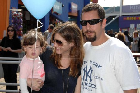 Photo for Jackie Sandler and Adam Sandler with daughter Sadie at the Kinerase Skincare Celebration On The Pier hosted by Courteney Cox to benefit the EV Medical Research Foundation. Santa Monica Pier, Santa Monica - Royalty Free Image
