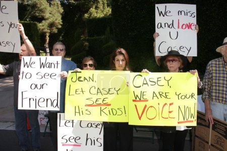 Photo for Ted Ball, Tom Rounds, Barbara Rounds, Rana Makarem, Eilene Olsen at a protest involving Casey Kasem's children, brother and friends who want to see him but have been denied any contact,  Private Location, Holmby Hills, CA 10-01-13 - Royalty Free Image