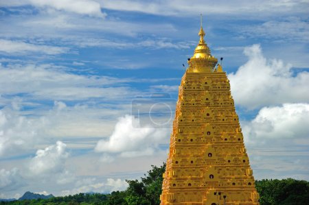 Photo for Golden Pagoda in the province of Kanchanaburi, Thailand - Royalty Free Image