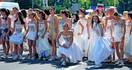 Photo for Wedding race festival, woman wearing white dresses - Royalty Free Image