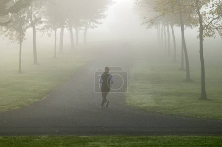 Photo for Young woman jogging before the course - Royalty Free Image