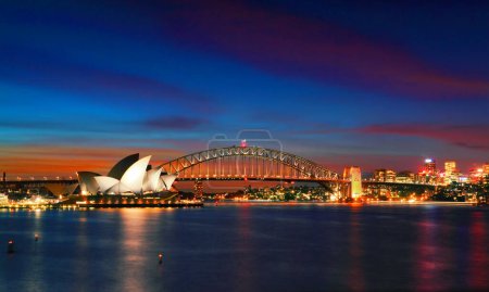 Photo for Sydney Opera House and Harbor Bridge at sundown - Royalty Free Image