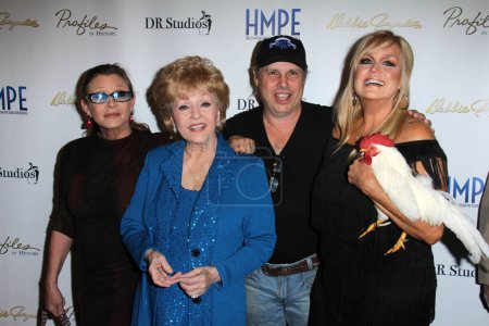 Photo for Carrie Fisher, Debbie Reynolds, Todd Fisher, Catherine Hickland at Debbie Reynolds - The Auction Finale Preview Night by Profiles In History with auction to take place on May 17 and 18, Debbie Reynolds Dance Studios, North Hollywood, CA - Royalty Free Image