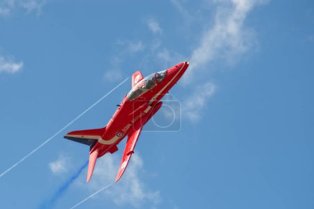 Photo for Red arrow jet closeup. Daytime shot. Aviation concept - Royalty Free Image