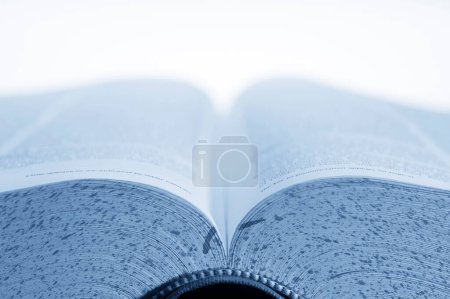 Photo for Open book with blue pages. - Royalty Free Image