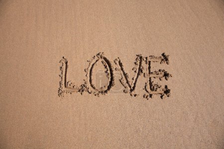 Photo for LOVE lettering on beach sand - Royalty Free Image