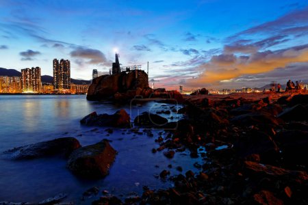 Téléchargez les photos : Hong kong à l'heure du coucher du soleil - en image libre de droit