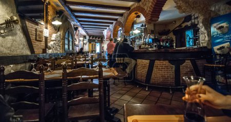 Photo for Dinner at the pub in Segovia - Royalty Free Image